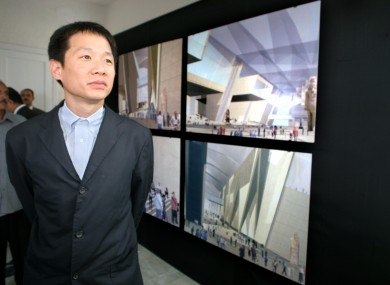 Irishman Shih-Fu Peng of the Dublin firm Heneghan in front of his designs