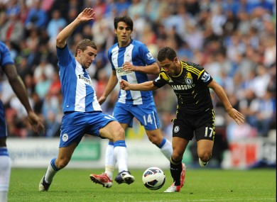 Chelsea's Eden Hazard evades James McArthur of Wigan.