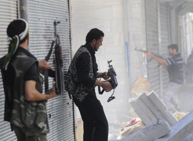 Free Syrian Army soldiers during clashes with Syrian government forces in Aleppo