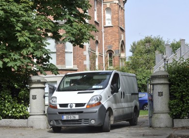 Personal items belonging to the McFeely family being removed from their house yesterday.