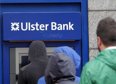 File photo of customers queuing for an Ulster Bank ATM.