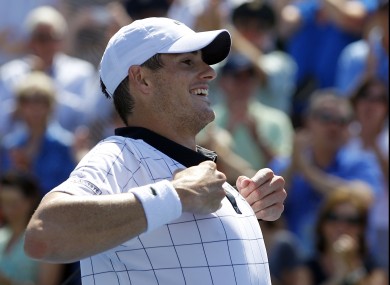 John Isner performs the