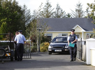 A hearse removes the body of Anthony Ward from his home at Harrison Place, Charleville, Co Cork today.