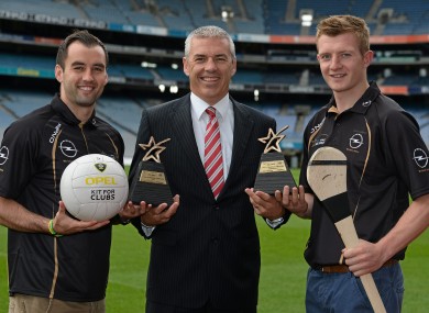 Donegal footballer Karl Lacey and Galway hurler Joe Canning with Opel's Ray Finlay.