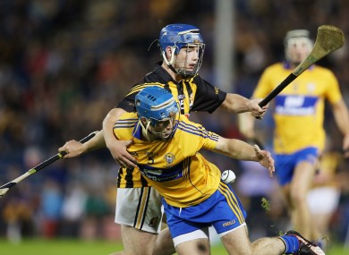 Kilkenny's Ger Aylwatd and Patrick O'Connor of Clare battling in tonight's game.