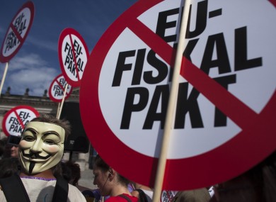 German protesters at a demonstration against the fiscal pact in front of the Rechistag in June
