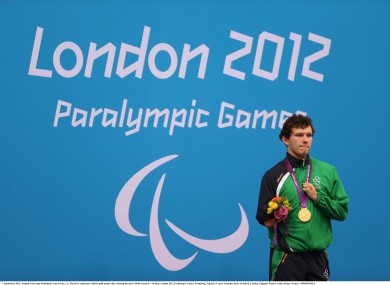 Darragh McDonald, from Gorey, Co. Wexford, celebrates with his gold medal after winning the men's 400m freestyle.