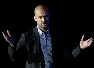 Former Barcelona soccer coach Pep Guardiola speaks at Mexico Siglo XXI on Friday.