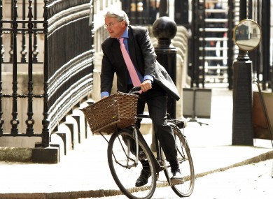 On his bike: Tory minister Andrew Mitchell (File photo)