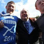 Scotland First Minister Alex Salmond (centre) poses for a photograph with supporters at a rally for Scottish Independence in Princess Street Gardens, Edinburgh, as thousands of people took to the streets of Edinburgh in one of the largest pro-independence marches the city has seen.
