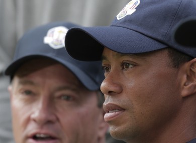 USA's captain Davis Love III and Tiger Woods pose for a photo at the Ryder Cup PGA golf tournament.