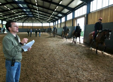 Aiden O'Brien instructs riders at Ballydoyle in 2008.