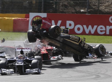 Romain Grosjean (right) in action for Lotus this season.
