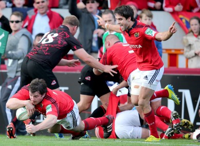 Conor Murray celebrates as Damien Varley dives over for the fourth try.