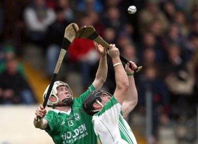 O’Loughlin Gaels' Eddie Kearns with Conor Walsh of Ballyhale Shamrocks.