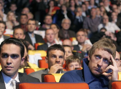Alberto Contador of Spain, left, and Bradley Wiggins of Britain, attend the presentation of the hundredth edition of the Tour de France cycling race, in Paris today.
