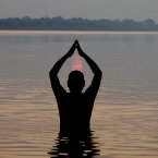 A Hindu devotee offers prayers to the sun god after taking holy dips in the River Ganges on the occasion of Anant Chaturdashi festival in Mirzapur, India. The annual Anant Chaturdashi festival is the culmination of ten days when members of the Jain community reflect upon the past year to take steps towards purifying the soul and taking steps towards ten aspects that include giving and seeking forgiveness, prayers and meditation, non-violence towards all living beings, and riding the soul of jealousy, egoism and anger. (AP Photo/Anshul Mishra)