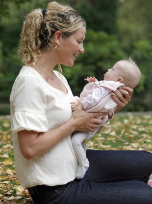 Five-month-old April Coveney and mother Therese are pictured as part of National Breastfeeding Week