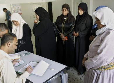 Women line up to vote in today's local elections in the West Bank. The ballots are the first to be held in the West Bank since the 2006 general election.
