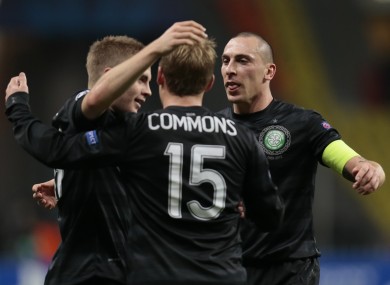 Celtic's team players celebrate their victory over Spartak Moscow after the Champions League Group G soccer match at the Luzhniki stadium in Moscow.