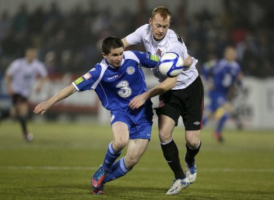 Shields battles Man of the Match Seanie Maguire during Tuesday evening's 2-2 draw at Oriel Park.