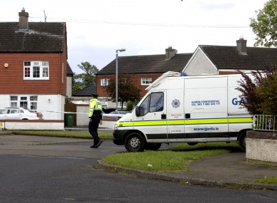 Gardai at the scene in Moorfield Avenue at the time of the killing.