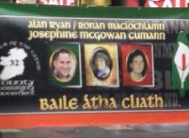 The banner featuring the face of Alan Ryan, left, on O'Connell Street today.