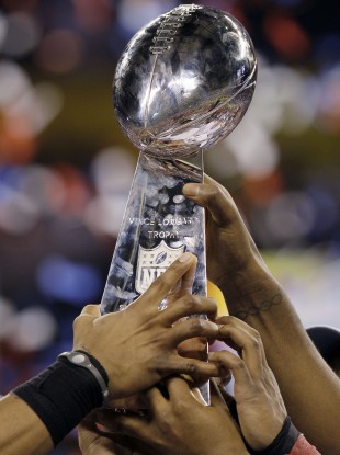 Who will be holding the Vince Lombardi trophy come Sunday night?