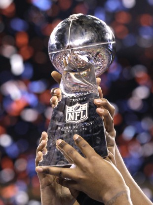 Who will be holding the Vince Lombardi trophy come Sunday night?