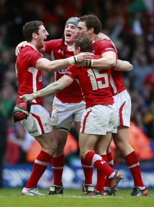 Cuthbert, Davies, North and Halfpenny celebrate beating France.