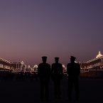 Members of  India's military band rehearse for the upcoming Beating Retreat ceremony as workers, unseen, test the illumination at Raisina hill where India's most important ministries and the presidential palace are housed, in New Delhi, India. (AP Photo /Manish Swarup)