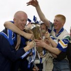 A young Mullane is mobbed by fans after their historic victory in Páirc Uí Chaoimh.