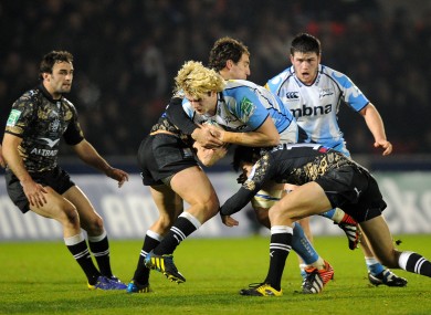 Richie Gray is tackled by Montpellier's Santiago Fernandez (left) and Francois Trinh-Duc (right).