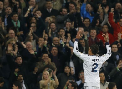 Real Madrid's Raphael Varane from France celebrates his goal during a semifinal, first leg, Copa del Rey soccer match against FC Barcelona at the Santiago Bernabeu stadium.