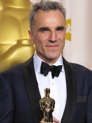 Daniel Day-Lewis poses with his award for best actor in a leading role for