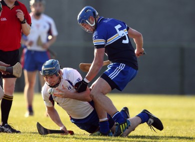 Mary Immaculate's Conor Cooney in action against DIT's Dean Curran.