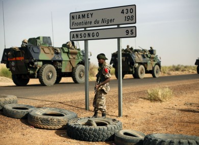 French armoured vehicles are seen heading towards the Niger border in Mali.