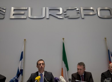 Interpol chiefs with the press at The Hague today.