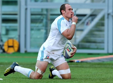 Italy's Sergio Parisse celebrates his try.