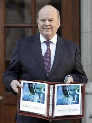 Michael Noonan with his last budget in December 2012.