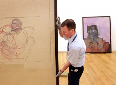 Hugh Lane Gallery attendant Peader Fitzgerald packs up Francis Bacon paintings being moved to Brussels.