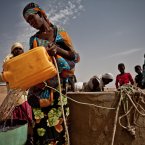 Fatimata Awade drawing water from a well in the community of Natriguel, It one of the few wells that hasn't run dry in the drought. People living in the Sahel region of Mauritania are at risk from food insecurity due to the lack of rain .