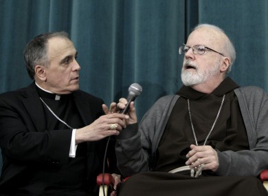 Texan Cardinal Daniel Nicholas DiNardo, and Sean Patrick O'Malley of Boston, speak at yesterday's press briefing.